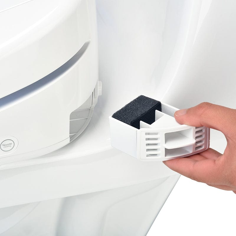 User installing deodorizer in Brondell Swash 1400 Luxury Bidet Toilet Seat - White, showcasing the insert mechanism.