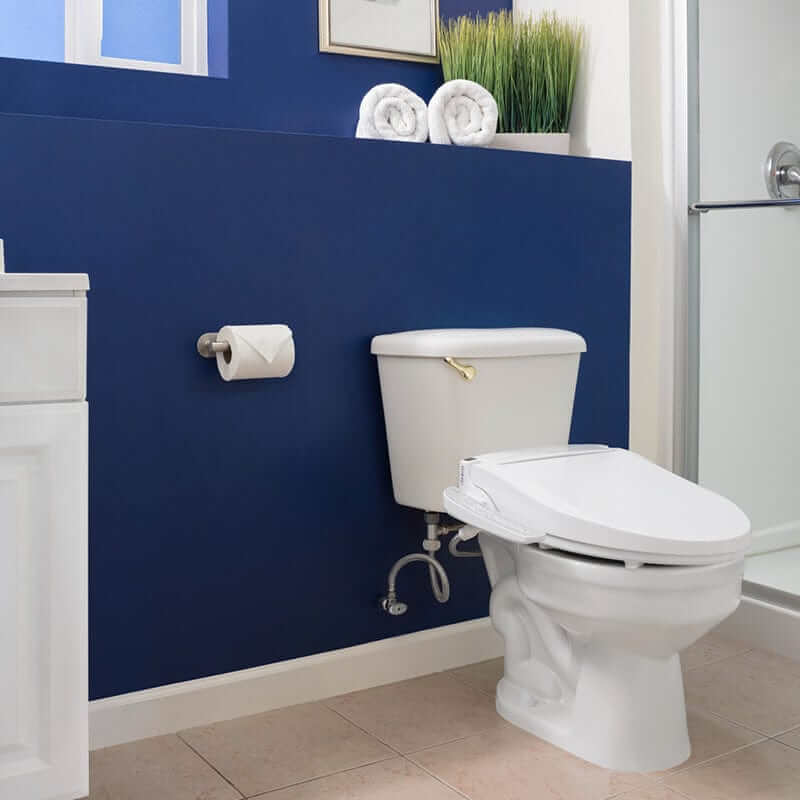 Bathroom with Brondell Swash Bidet Toilet Seat DR801 installed, featuring heated seat, adjustable nozzle, and eco-saving mode.
