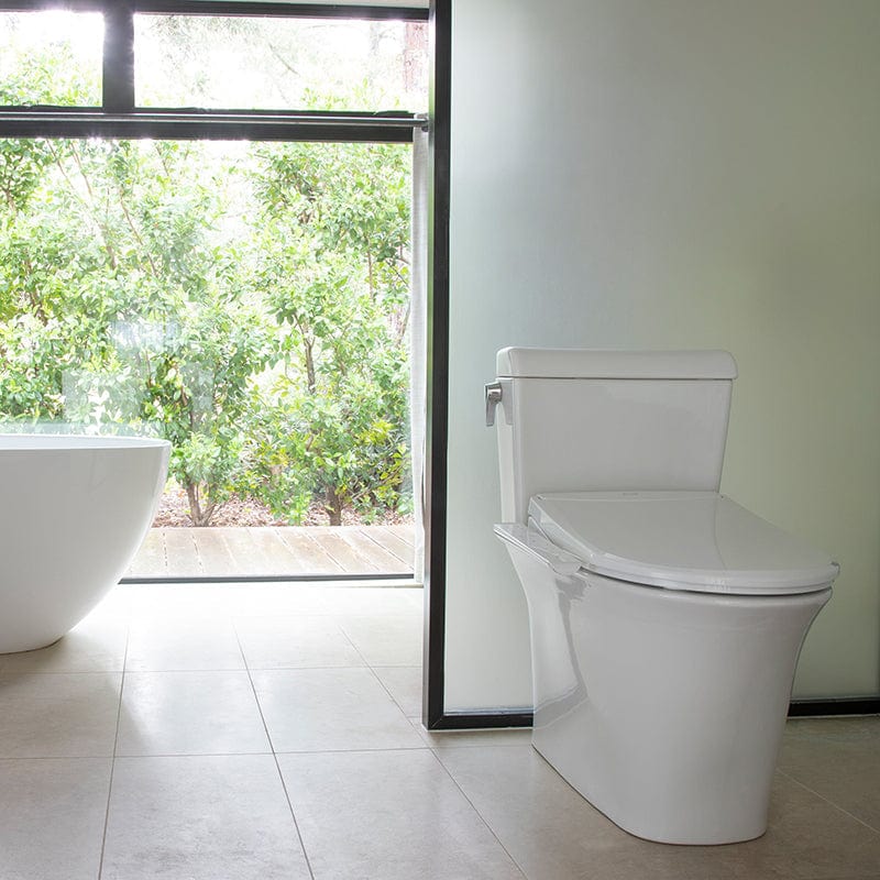 Brondell Swash Thinline T22 bidet toilet seat in modern bathroom with garden view.