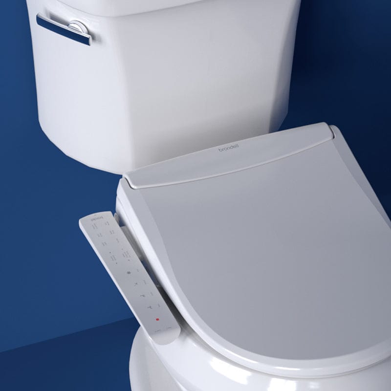 Brondell Swash Thinline T22 Bidet Toilet Seat with control panel, shown installed on a toilet in a bathroom setting.