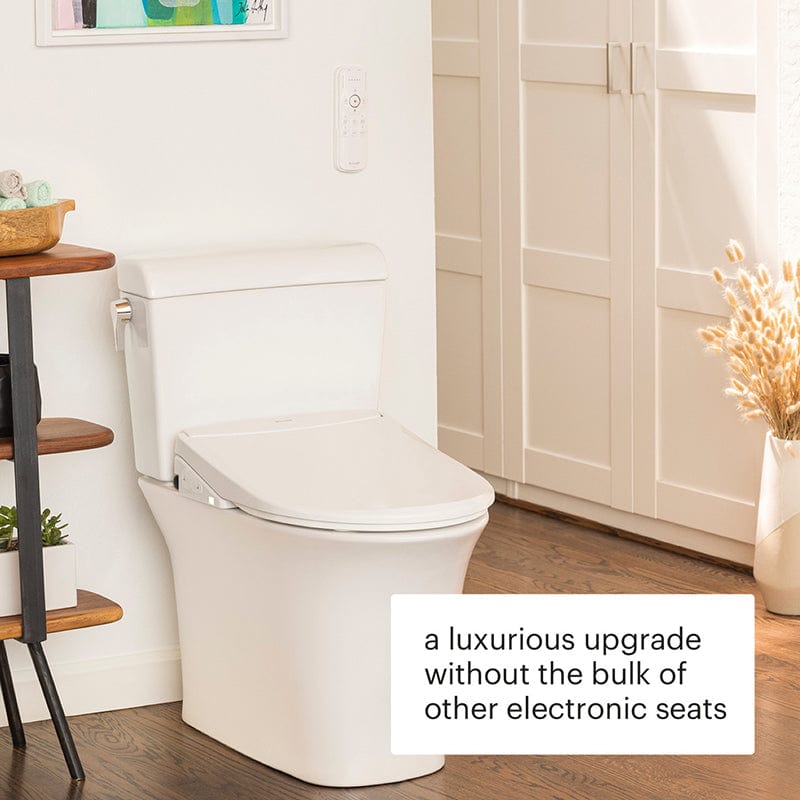 Modern bathroom with Brondell Swash Thinline T44 bidet toilet seat, showcasing sleek design and compact electronic upgrade.