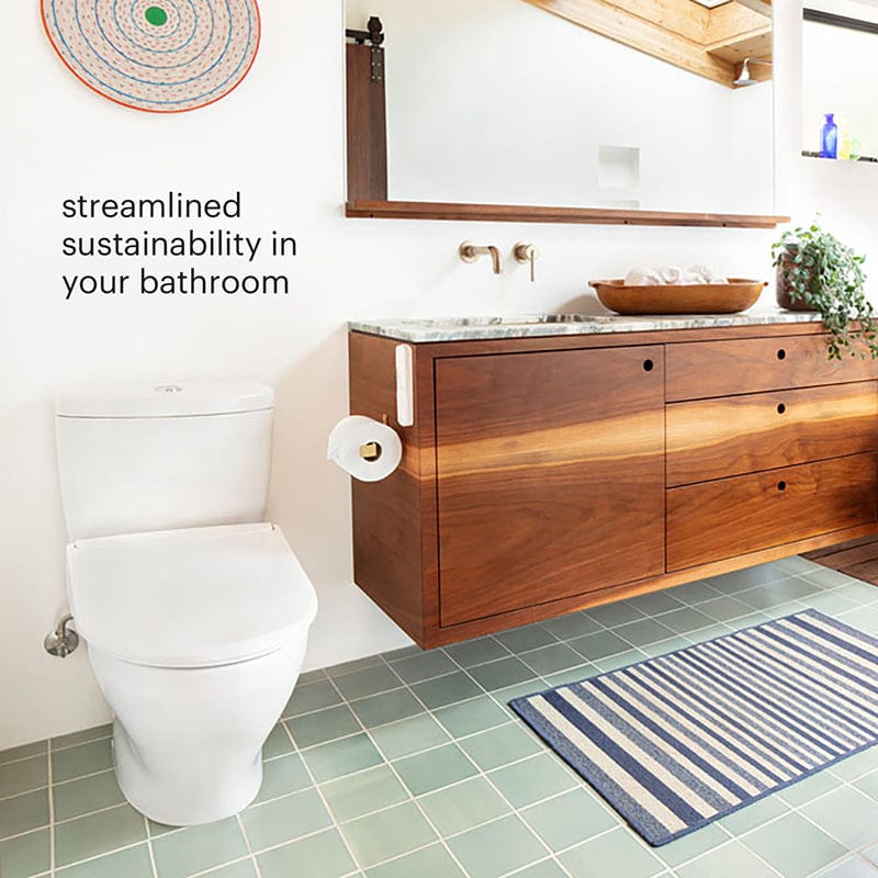 Modern bathroom with Brondell Swash Thinline T44 Bidet Toilet Seat, wood vanity, and green tiles for streamlined sustainability.