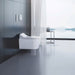 Duravit SensoWash Classic Starck Bidet Seat - Side view of wall hanging modern toilet on a modern bathroom overseeing a lake