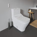 Duravit SensoWash Durastyle Slim Heated Bidet Seat - A modern white smart toilet with a closed lid and seat controls, shown in a minimalist gray bathroom setting with a wooden stool, bath accessories, and a bamboo mat.