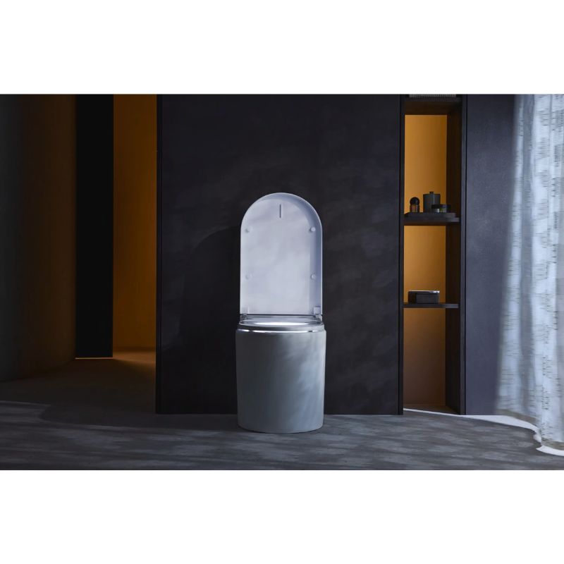 Duravit SensoWash Starck I Plus - A modern toilet with an open hinged lid in a minimalist bathroom setting with dark textured walls and warm ambient lighting.
