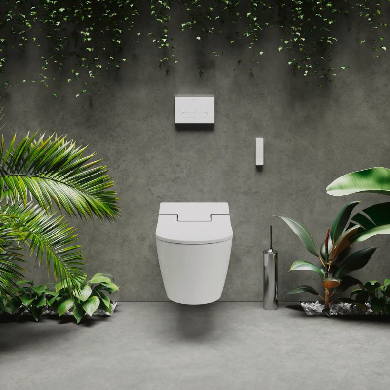 Duravit SensoWash Starck Slim Heated Bidet Seat - Front view installed in a modern bathroom with plants
