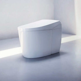 TOTO Neorest AS Bidet Toilet - Modern white toilet bowl in a light gray bathroom