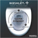 TOTO Aquia IV Washlet+ S7A One-Piece - Washlet+ toilet technology display with TOTO branding on a dark background
