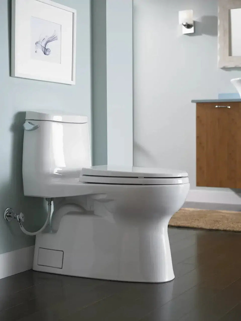 TOTO Carlyle II One-Piece Toilet with skirted design and SoftClose seat in modern bathroom setting