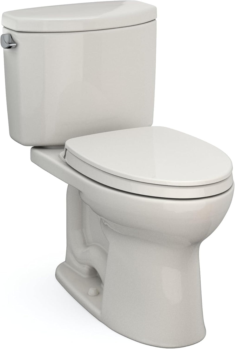 TOTO Drake II Two-Piece Elongated Sedona Beige - Beige toilet with closed lid on a white background
