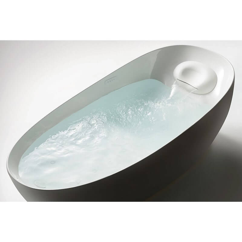 TOTO Flotation Tub with Zero Dimension design, featuring sleek contours and water flow in a modern bathroom setting.