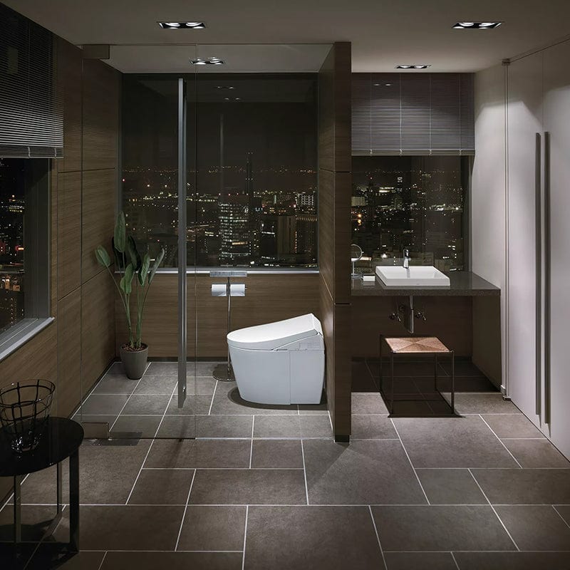 Modern bathroom with TOTO Neorest AH Dual Flush Integrated Bidet Toilet in a stylish city apartment setting.