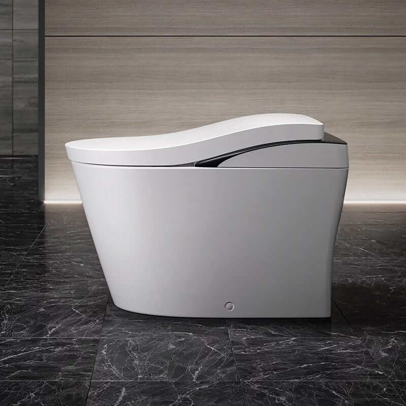 Modern TOTO Neorest LS bidet toilet with sleek design on marble floor