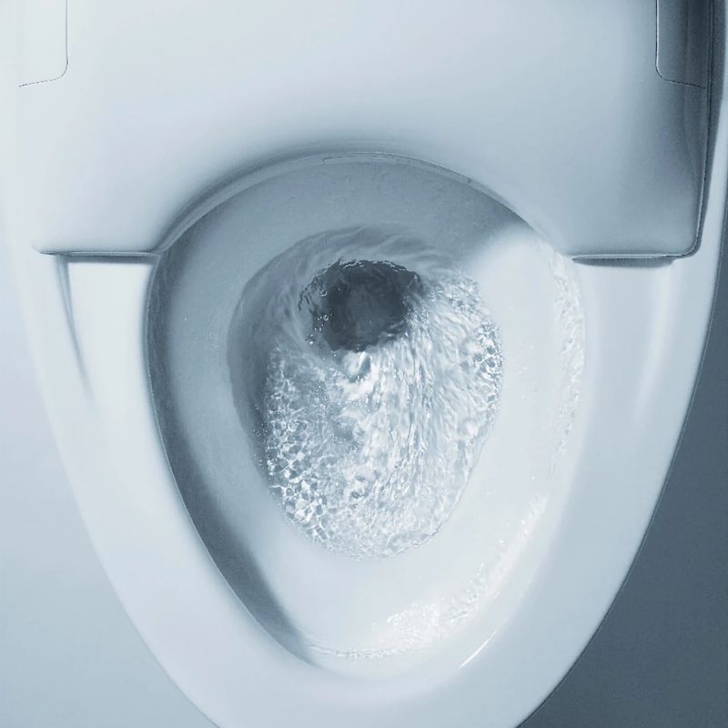 TOTO NEOREST NX2 Dual-Flush Toilet - Close-up of a toilet bowl with water swirling down the drain.