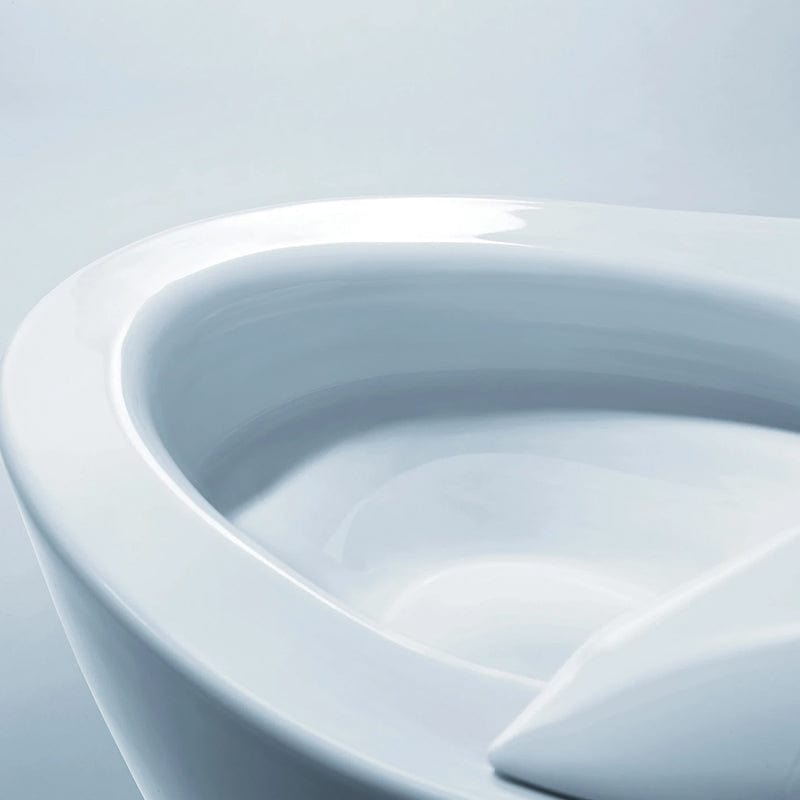 Close-up of TOTO Neorest NX2 Dual Flush Bidet Toilet rim, showcasing sleek design and advanced flushing technology.