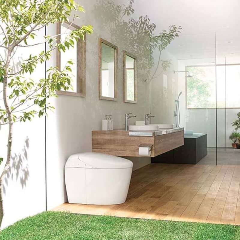 Elegant bathroom with TOTO Neorest RH Dual Flush Integrated Bidet Toilet, featuring modern design and eco-friendly dual flushing system.