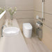 Modern bathroom with TOTO Neorest RH Dual Flush Integrated Bidet Toilet and stylish sink.