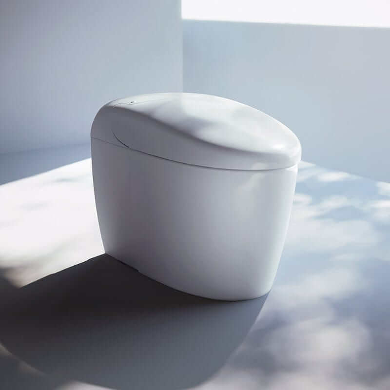 TOTO Neorest RS Dual Flush Bidet Toilet in modern bathroom setting, emphasizing sleek design and eco-friendly functionality.