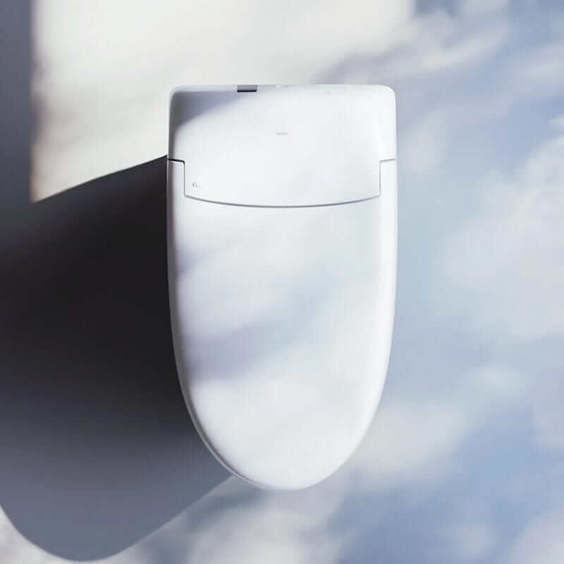 TOTO Neorest RS Dual Flush Bidet Toilet with sleek design and advanced functionality set against a cloudy backdrop.