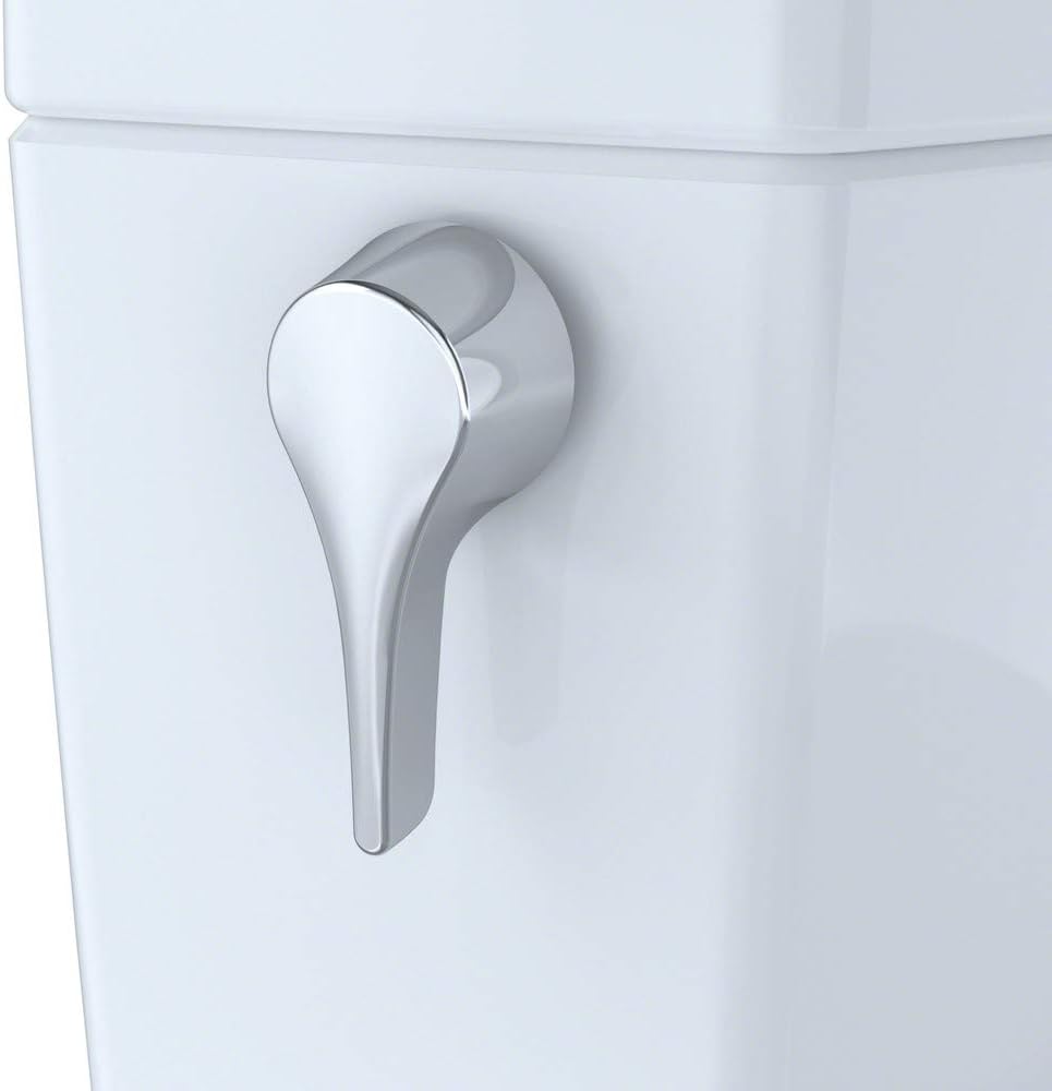 TOTO Nexus 1PC Toilet - Sedona Beige - Close-up of a chrome flush handle on a white toilet tank