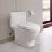 TOTO Nexus One-Piece Toilet 1.28 GPF in Cotton color, installed in modern bathroom setting, showcasing sleek design.