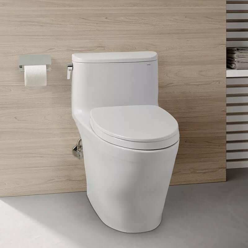 TOTO Nexus One-Piece Toilet with TORNADO FLUSH, CEFIONTECT glaze, and elongated SoftClose seat in a modern bathroom setting.