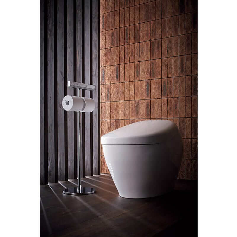 TOTO Neorest NX1 Dual Flush Bidet Toilet - White toilet with a stand and toilet paper holder against a wooden tiled wall.