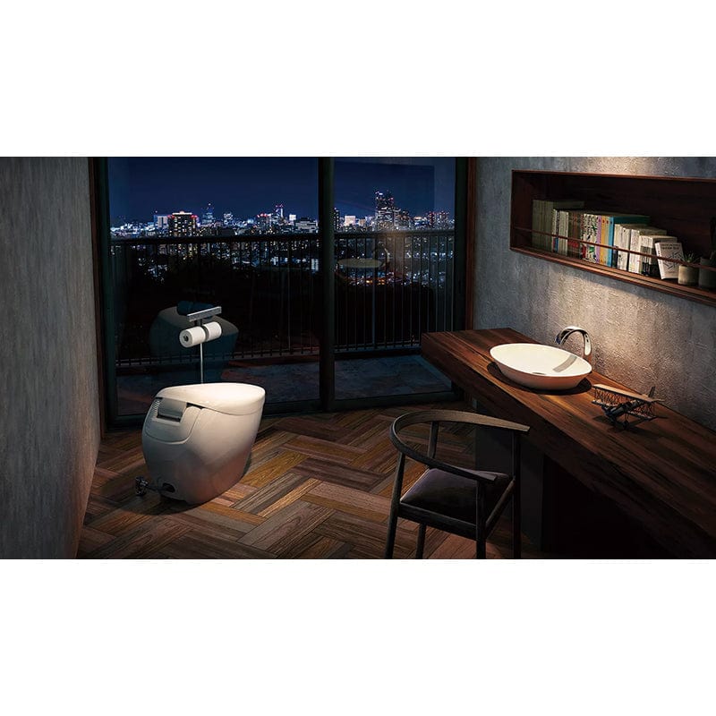 Modern bathroom with TOTO Neorest NX2 dual flush bidet toilet, featuring city view at night.