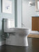 TOTO Carlyle II one-piece toilet with 1.28 gallons per flush, modern bathroom setting