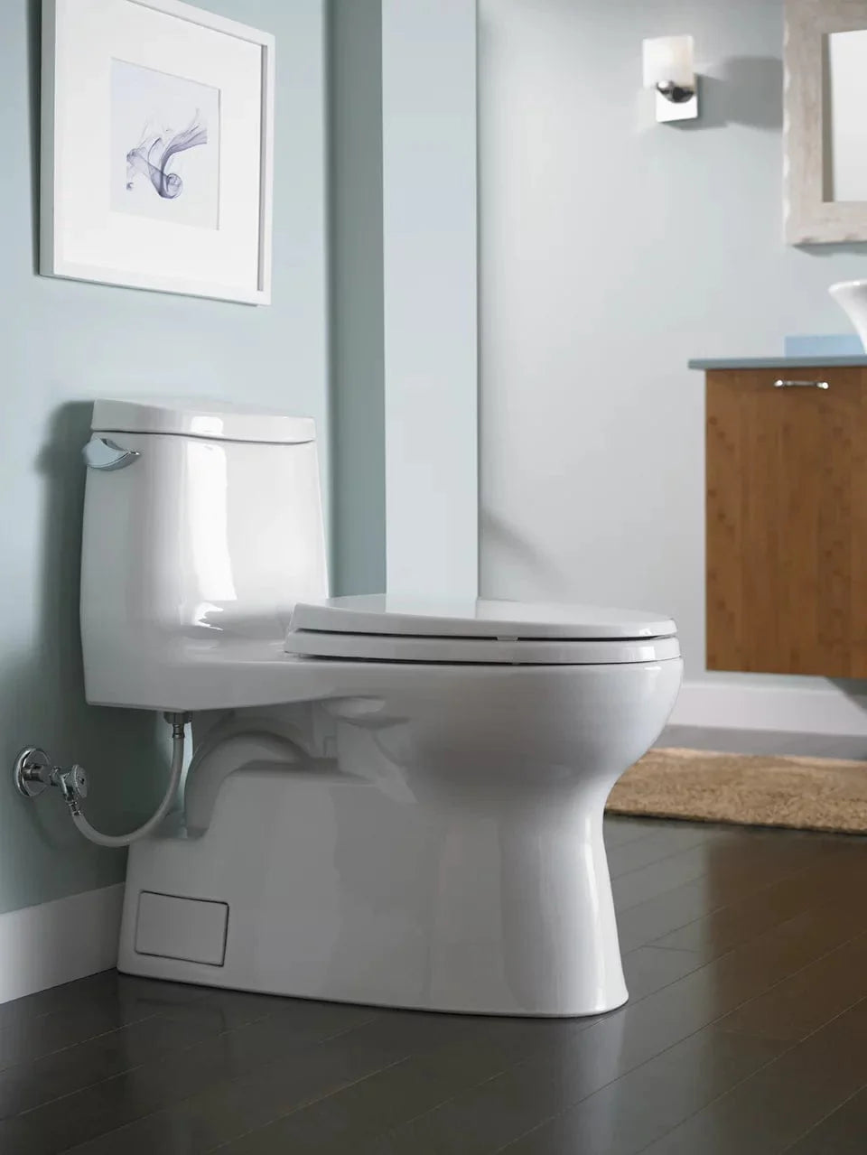 TOTO Carlyle II one-piece toilet with 1.28 gallons per flush, modern bathroom setting