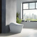TOTO Washlet G5A Lite Integrated Smart Toilet - Modern white freestanding bathtub in a bathroom with a cityscape view