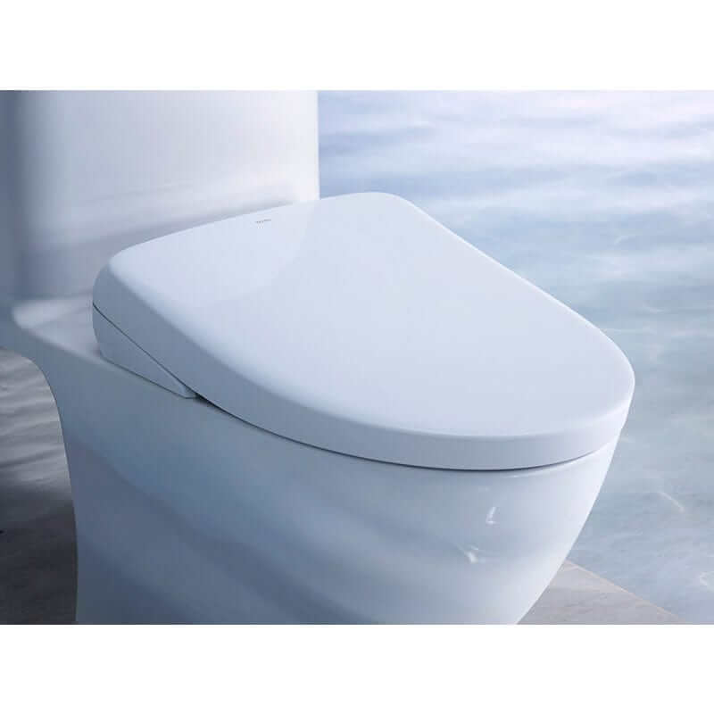 TOTO Washlet S7 Bidet Toilet Seat - White toilet with a soft-close seat in a bathroom setting